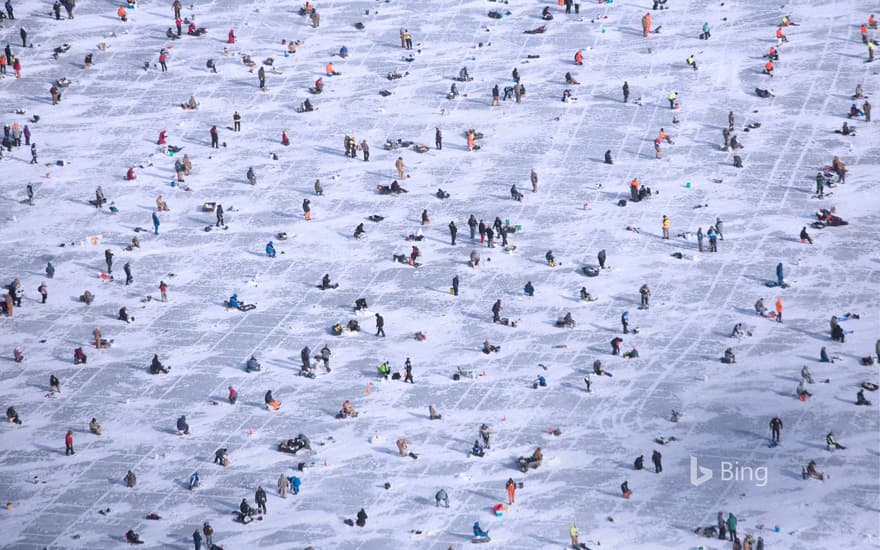 People ice fishing on Gull Lake in Brainerd, Minnesota