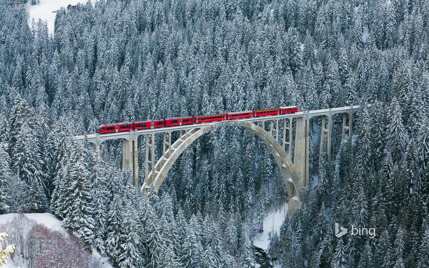 Rhaetian Railway train passing over Langwieser Viaduct, Switzerland