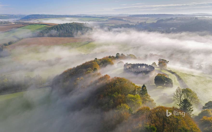 Autumn mist above Restormel Castle in Cornwall, England